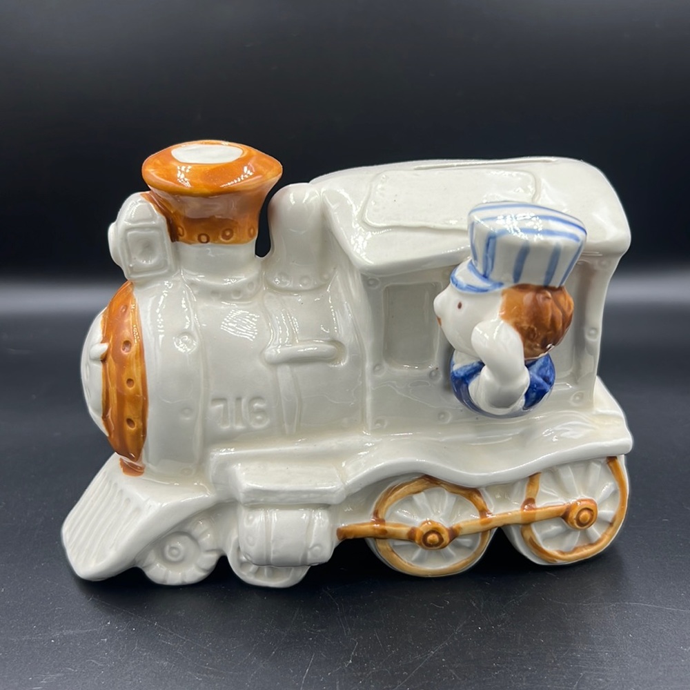 Vintage counterpoint Ceramic Coin Bank Cartoon Train Conductor, white, caramel